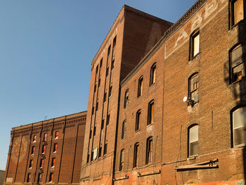 Low angle view of building against clear sky