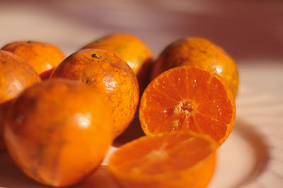 Close-up of orange fruits on table