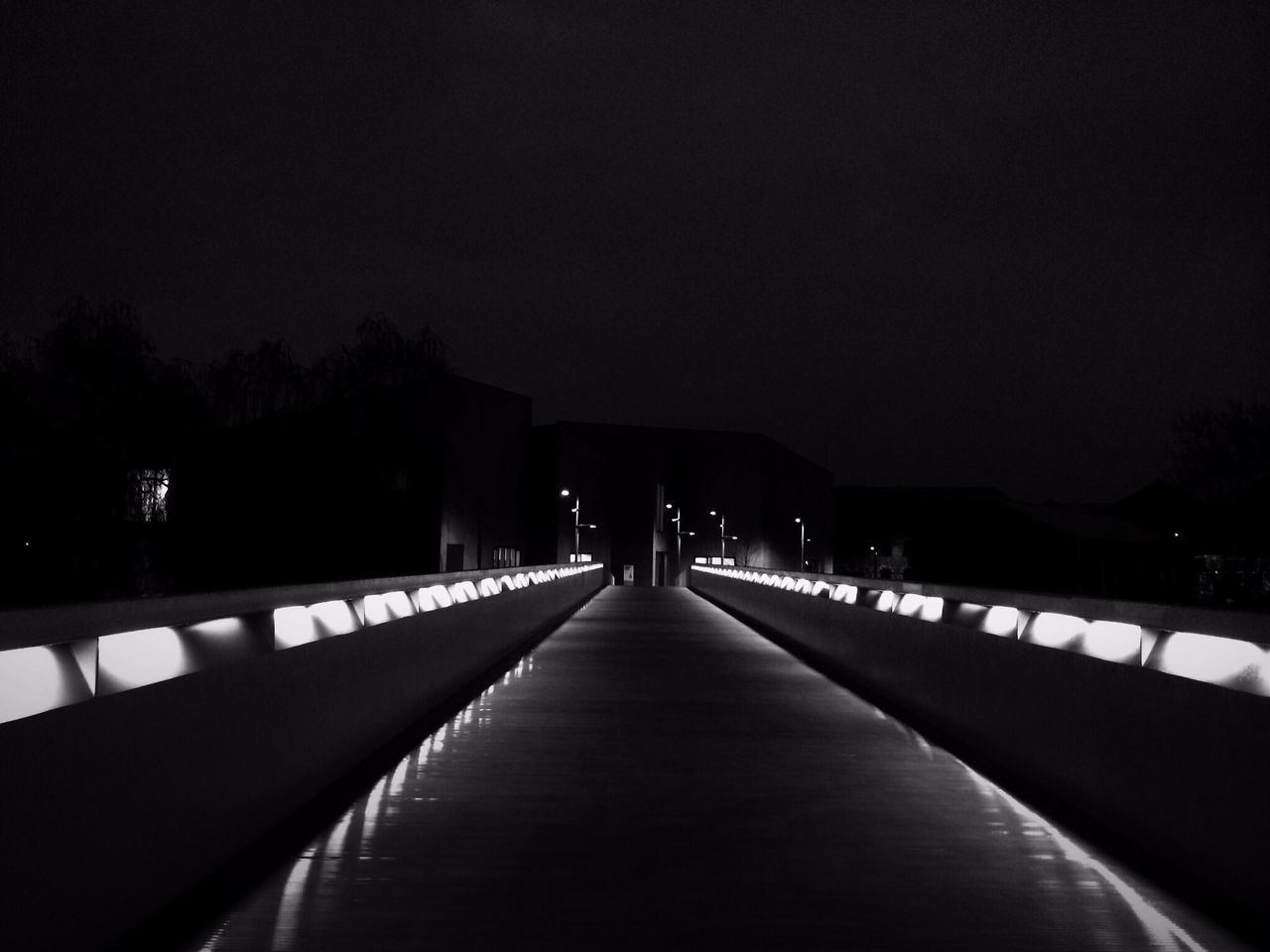 the way forward, built structure, architecture, night, illuminated, diminishing perspective, railing, sky, transportation, bridge - man made structure, vanishing point, water, copy space, clear sky, dusk, river, tree, connection, outdoors, long