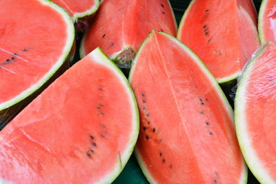 High angle view of watermelon slices for sale at market stall