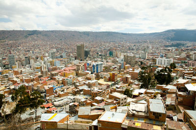 Aerial view of cityscape against sky