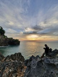 Scenic view of sea against sky during sunset