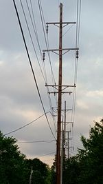 Low angle view of electricity pylon