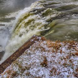 Close-up of water flowing at beach