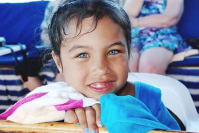 Close-up portrait of cute girl smiling