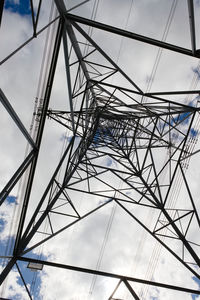 Interior corner of industrial electrical transmission pylon. cloudy background, abstract