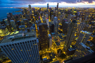High angle view of modern buildings in chicago with lights