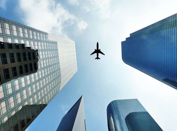 Low angle view of modern buildings against sky