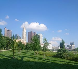 Panoramic view of park and buildings against sky