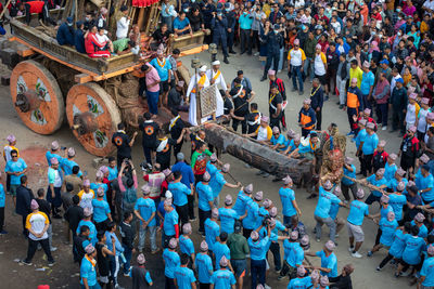 High angle view of people walking on street