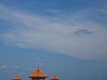 View of building against cloudy sky