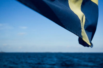 Close-up of blue sea against sky