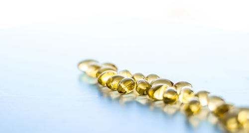 Close-up of pills against white background