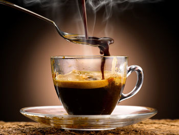 Close-up of coffee cup on table