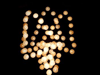 Close-up of illuminated light bulb