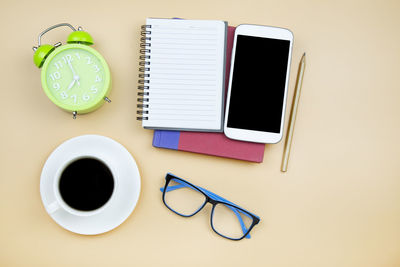 High angle view of coffee cup on table