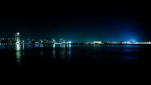 View of illuminated city at waterfront