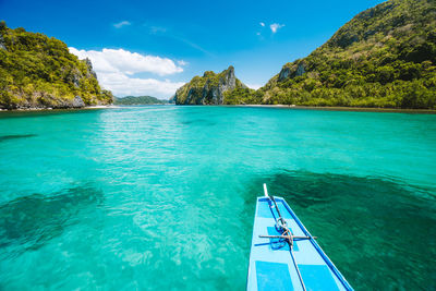 Boat in sea against sky