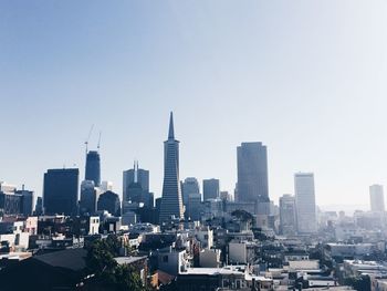 Cityscape against clear sky