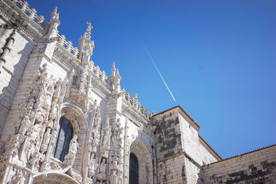 Low angle view of cathedral against blue sky