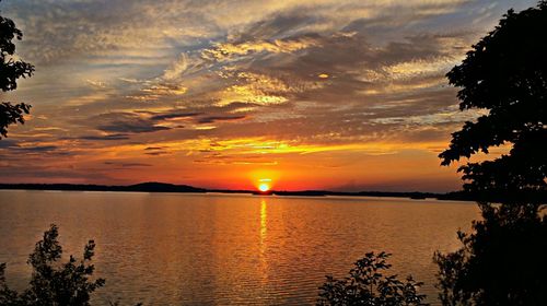 View of calm sea at sunset