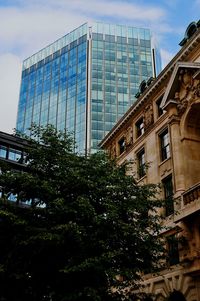 Low angle view of modern building against sky