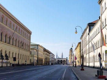 View of city street against clear sky