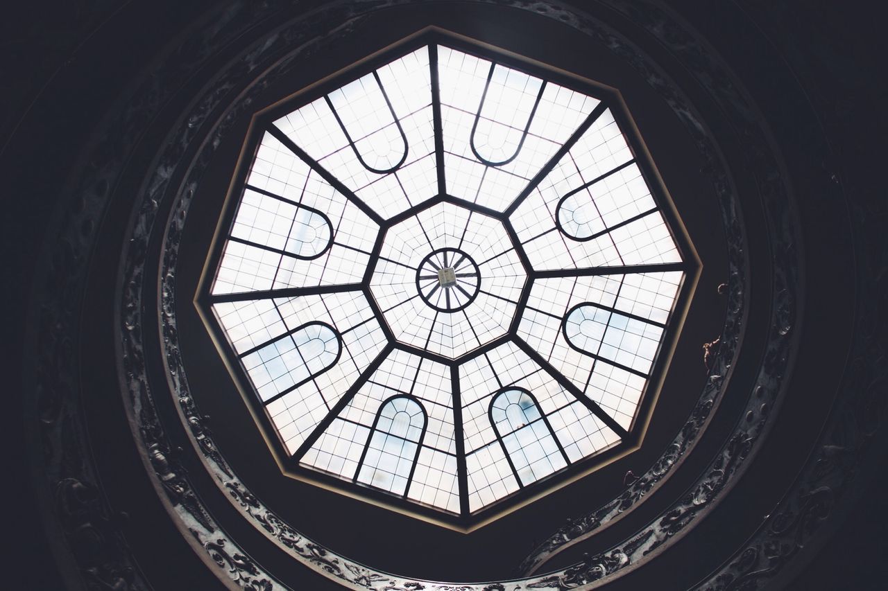 indoors, window, circle, design, geometric shape, pattern, glass - material, stained glass, transparent, art and craft, ceiling, skylight, art, no people, low angle view, shape, day, architecture, built structure, close-up