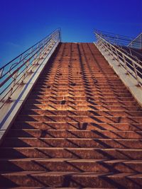 Low angle view of built structure against blue sky