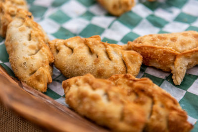 Close-up of meat and bread on plate