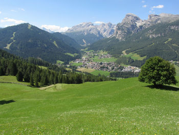 Scenic view of landscape and mountains against sky