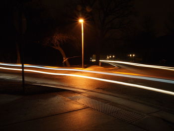 Light trails on road at night