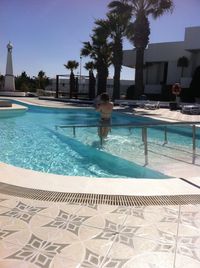 Woman swimming in pool