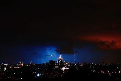 Illuminated cityscape at night