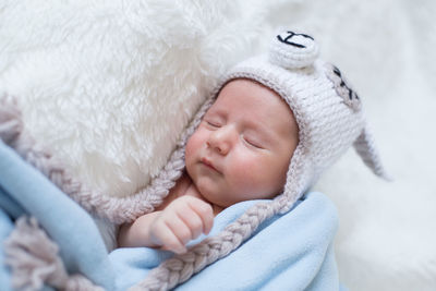 Cute baby sleeping in bed