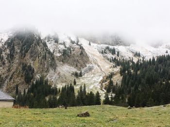 Scenic view of mountains against sky during winter