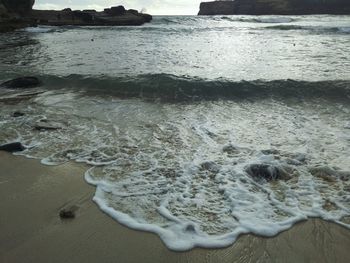 Close-up of waves on beach