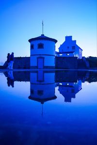Reflection of built structure in water