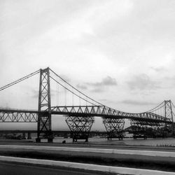 Bridge over river against sky