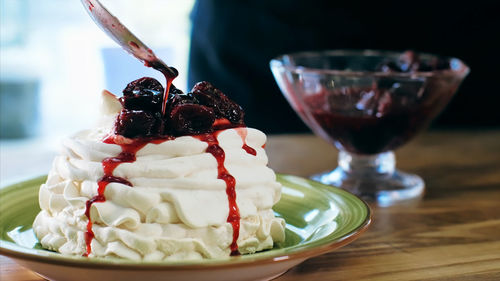 Close-up of ice cream in glass on table