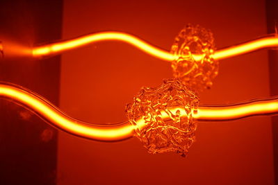 Close-up of illuminated lighting equipment