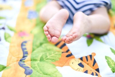 Close-up of hand holding baby