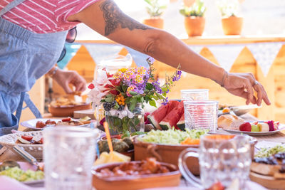 High angle view of people having food on table