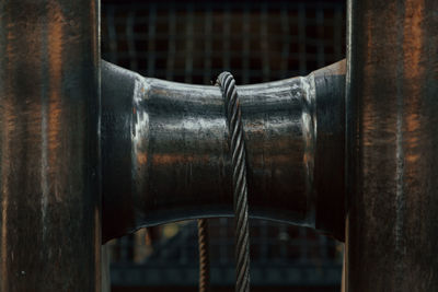 Close-up of rusty metal on window