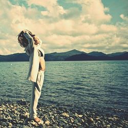 Scenic view of sea against cloudy sky