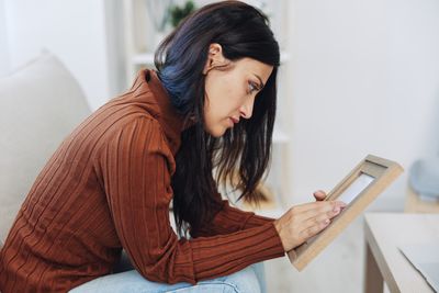 Young woman using mobile phone