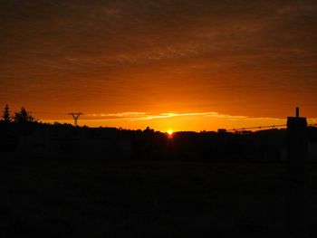Scenic view of silhouette landscape against sky during sunset