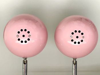 Close-up of wineglass against white background