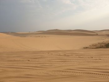 Scenic view of desert against sky