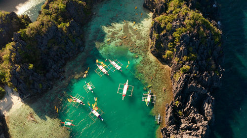 Aerial view of boats moored at sea